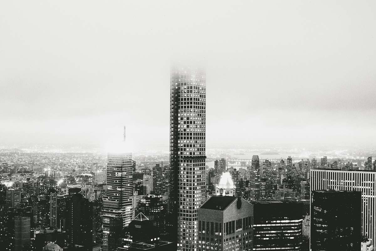 high rise grayscale photo of cityscape town
